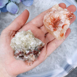 Unleash the Power of Tri-Colored Calcite: Enhance Prosperity & Intuition with the synergistic blend of Black, Green, Orange, Red, and White Calcite. Available in sizes 1.75
